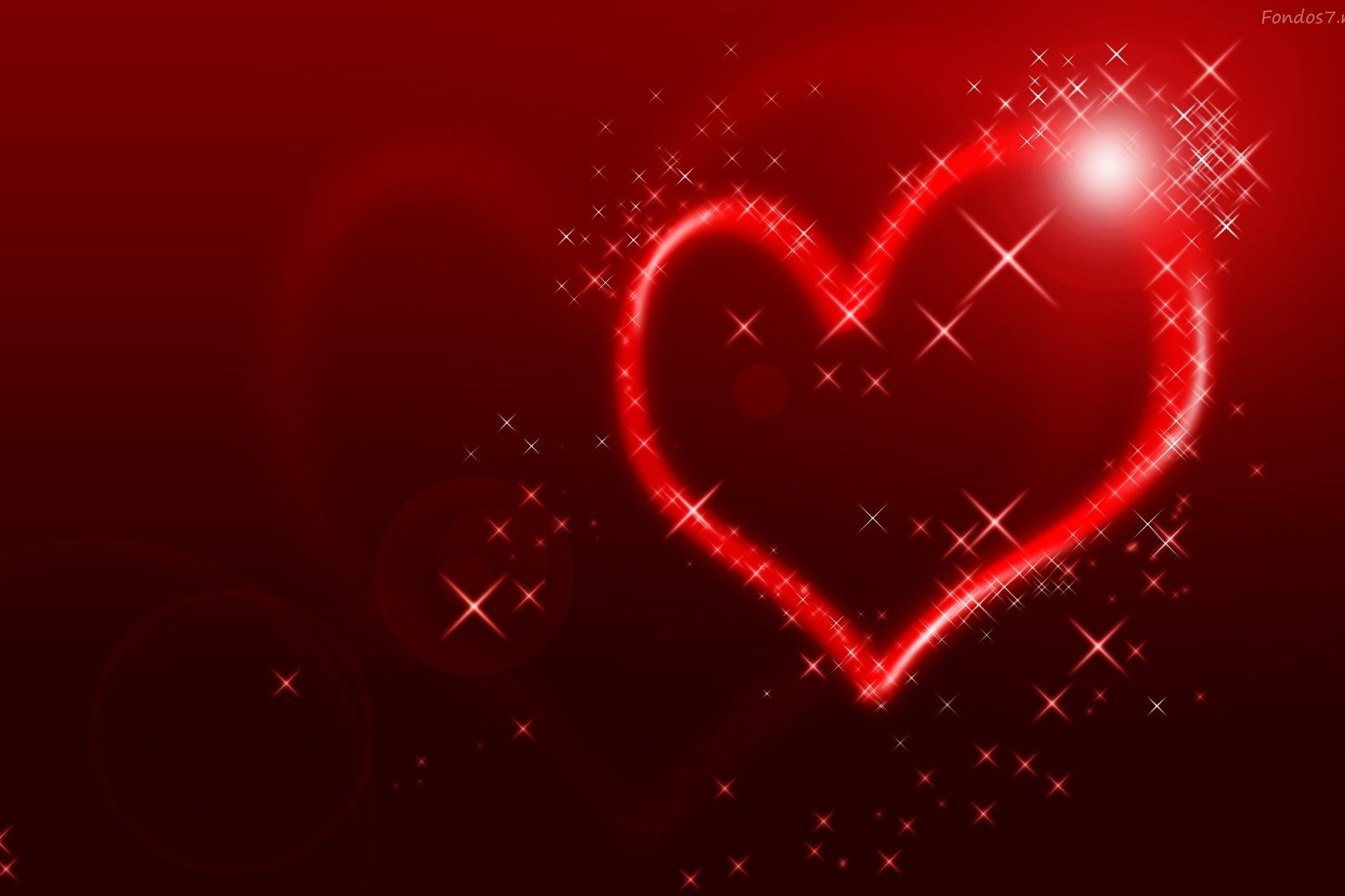 Un Corazón rojo con una luz brillante encima